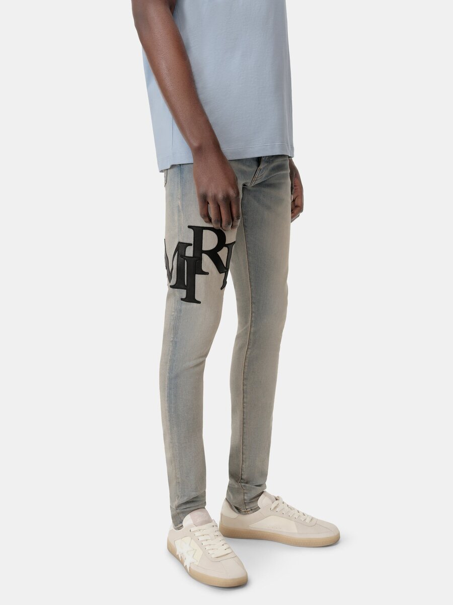 STAGGERED LOGO SKINNY JEAN